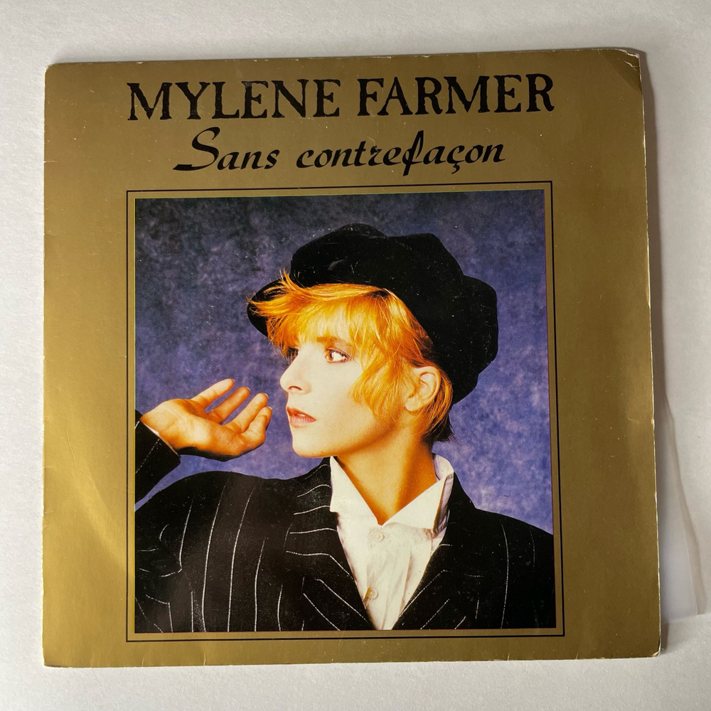 Винтажная виниловая пластинка 7 дюймов (маленькая пластинка) Mylene Farmer Sans Contrefacon (Франция 1987)