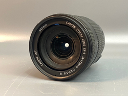 Canon EF-S 18-135mm 3.5-5.6 IS цапарина на передней линзе