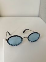 Очки Valentino