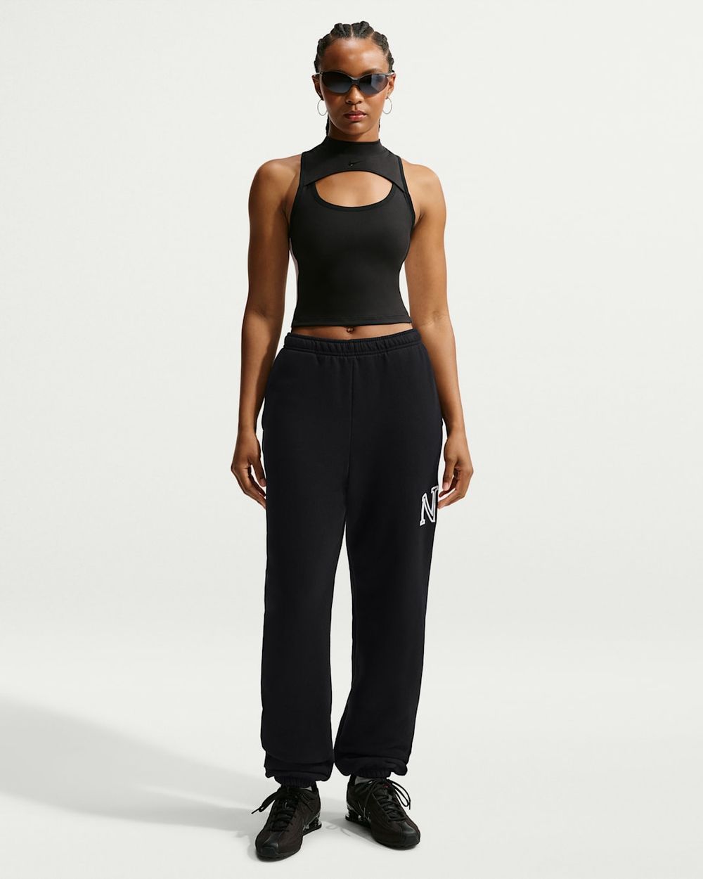 Брюки спортивные женские NIKE W NK STDO FLC MW OS LGO CF PNT