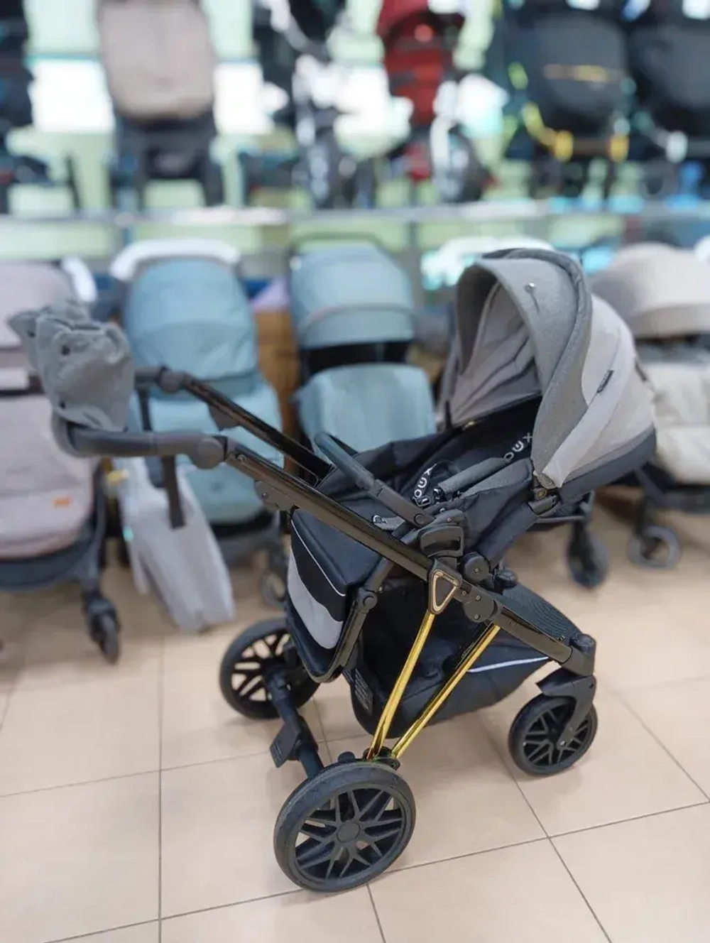 Детская коляска Luxmom F1 2в1 (серый, золотая рама)