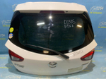 Амортизатор задней двери правый MAZDA DEMIO 2014-2019