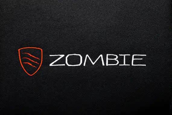 Кресло игровое Zombie Predator черный Neo Black с подголов. крестов. пластик