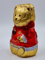Lindt Teddy Шоколад молочный в форме Мишки, красный/розовый 100 г 1 шт (Германия)
