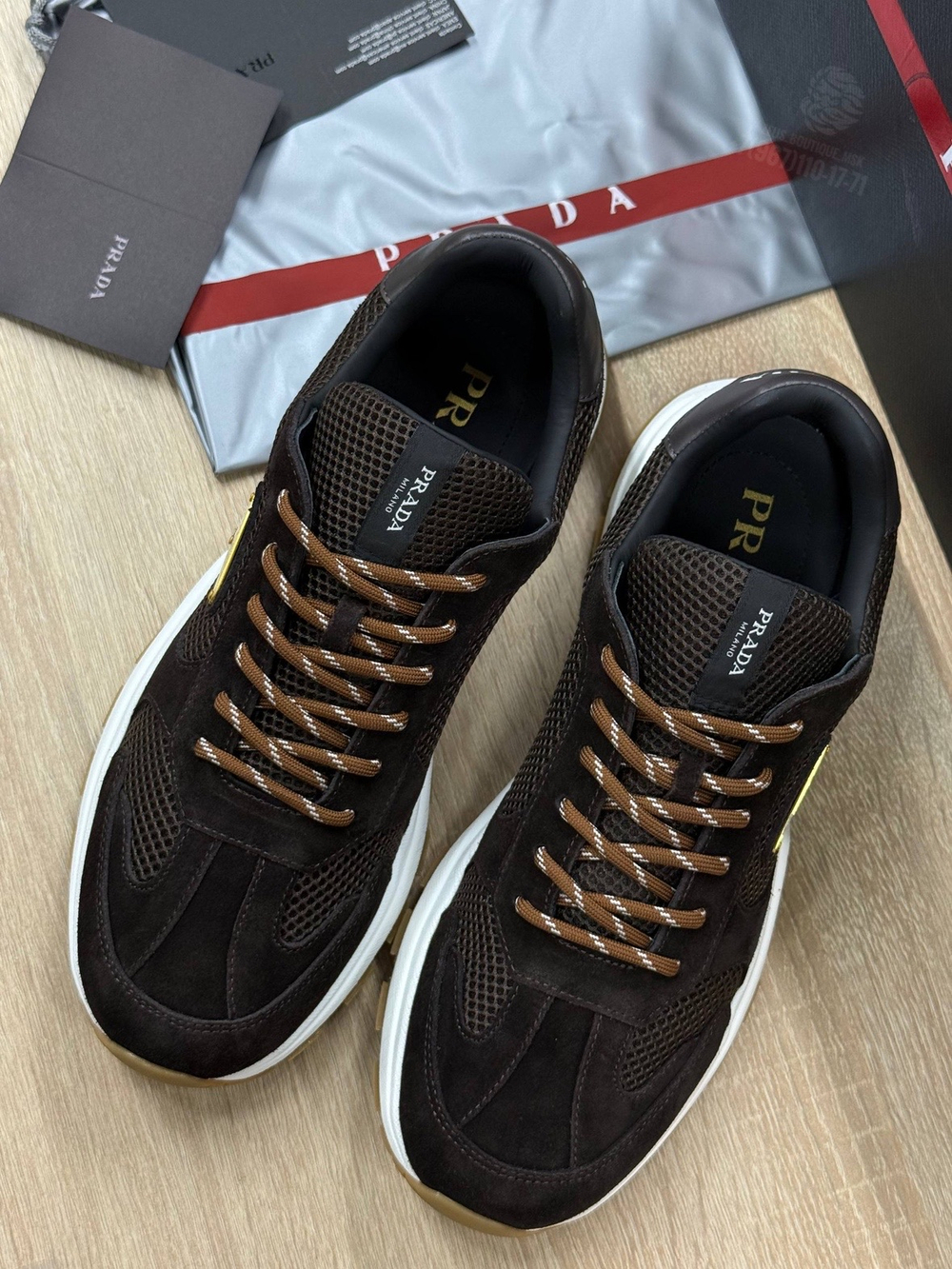Кроссовки Prada