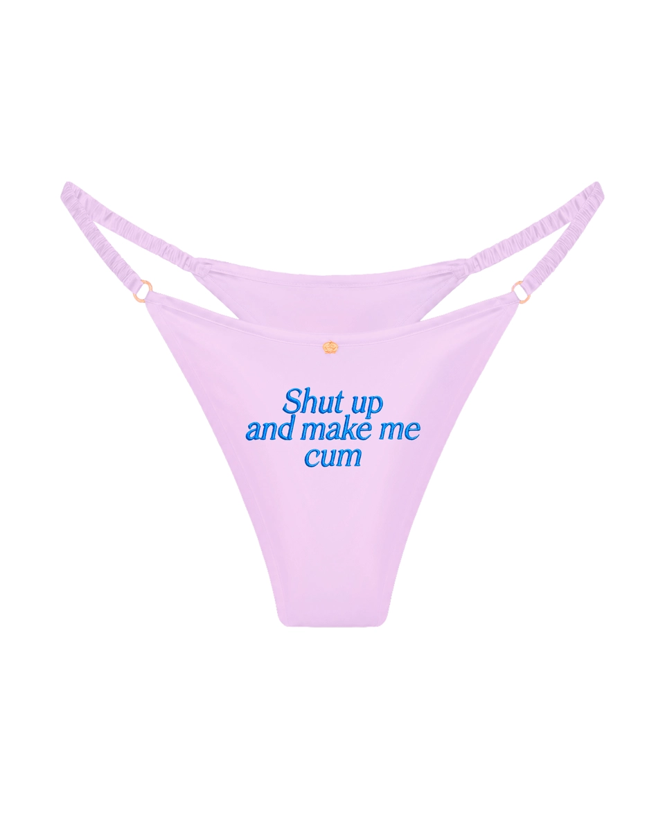 трусы стринги шелковые с надписью Shut up and make me cum сиреневые