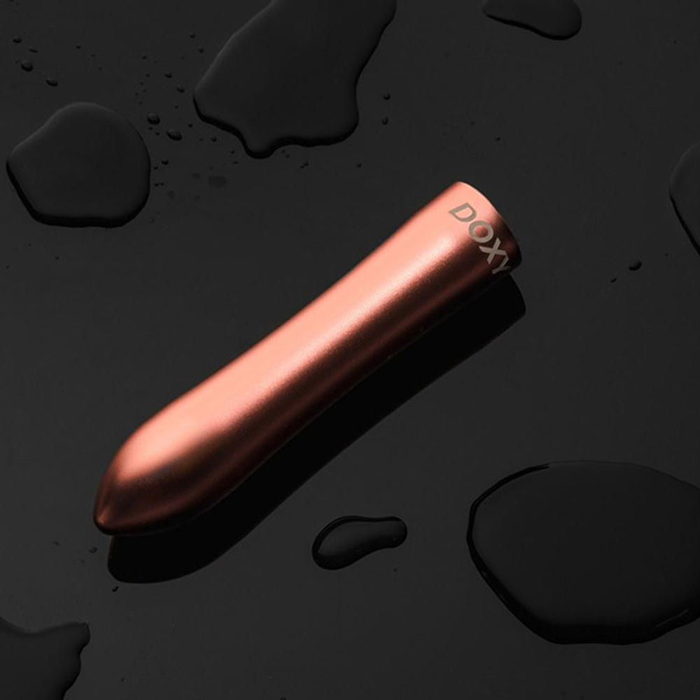 Розовая металлическая вибропуля 12см Doxy Bullet Rose Gold DXBLTRG25