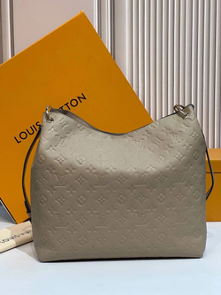 Сумка Hobo Métis Louis Vuitton цвета капучино