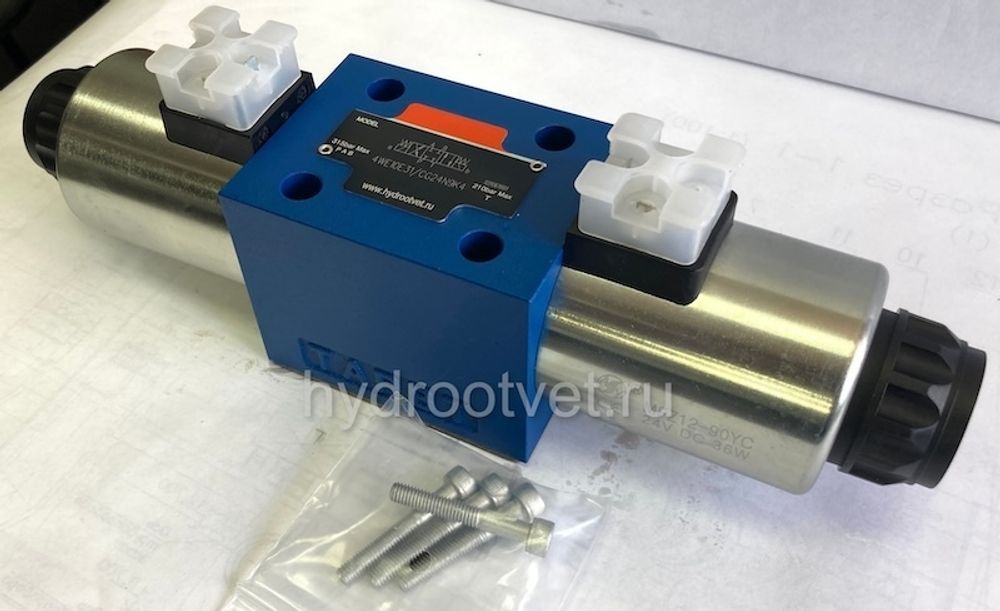 4WE10D31/OCG24N9K4 - Гидрораспределитель золотниковый Ду 10 с электроуправлением G24, схема D (574А/О), возврат - O = без пружины