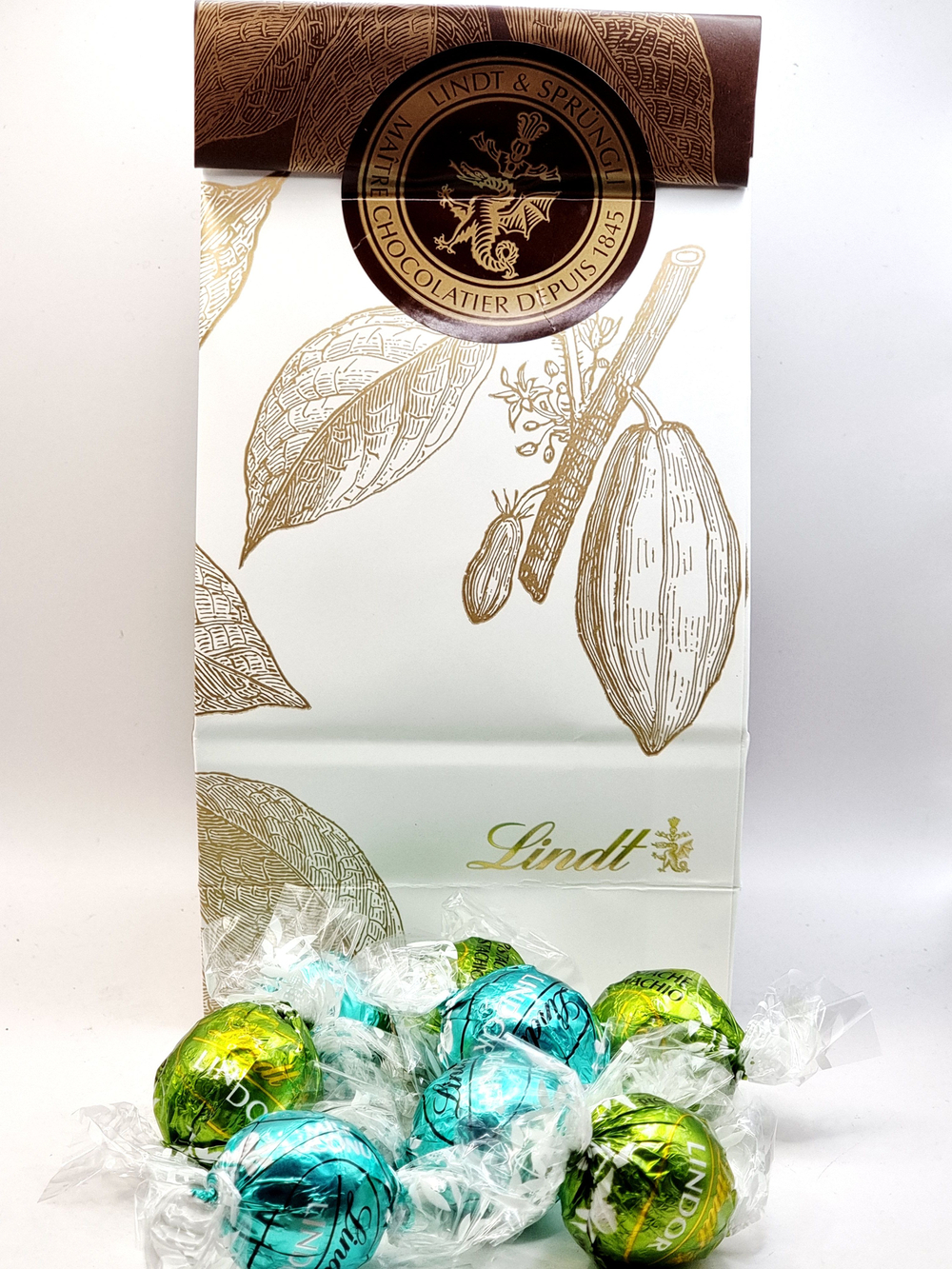 Микс шоколадных конфеты Lindt LINDOR кокос в молочном шоколаде и фисташки 200 г (Италия)