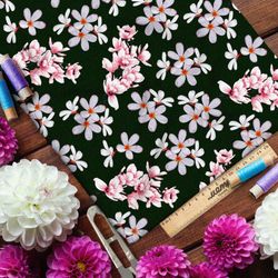Ткань флис опадающая сакура на тёмно-зелёном фоне