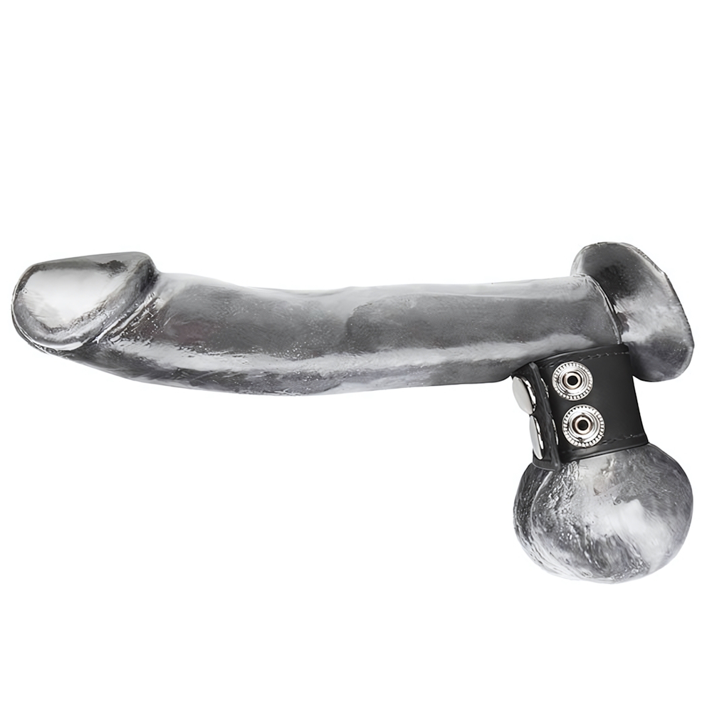 Хомут-утяжка для мошонки из искусственной кожи на клепках SNAP BALL STRETCHER (Цвет: черный)