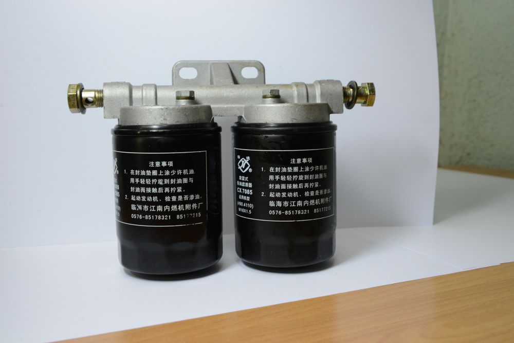 Фильтр топливный в сборе с кронштейном (двойной)TDL 36 4L/Fuel filter Assy