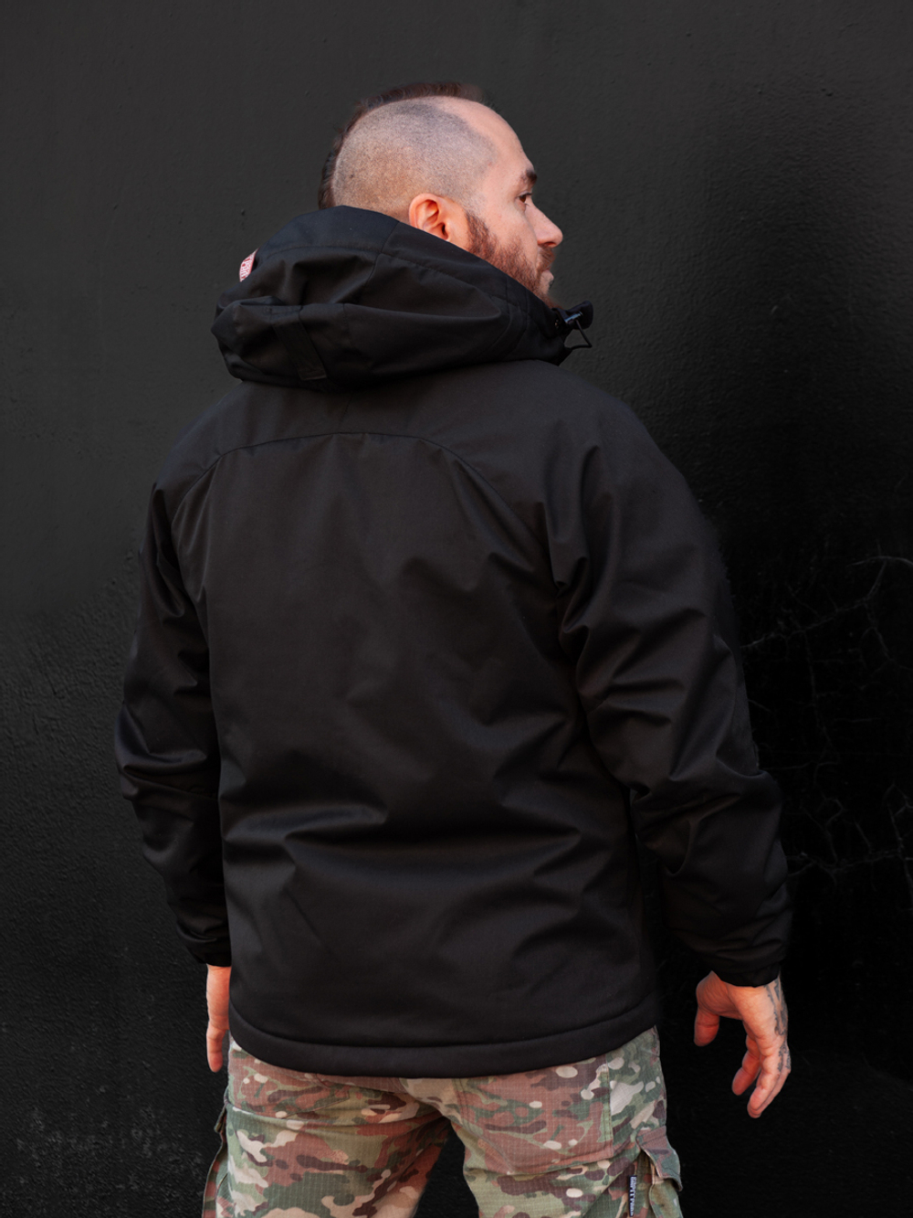 Black windbreaker