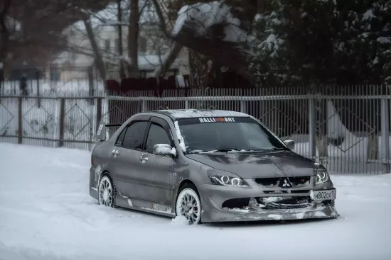 Юбка переднего бампера в стиле EVO для Mitsubishi Lancer 9