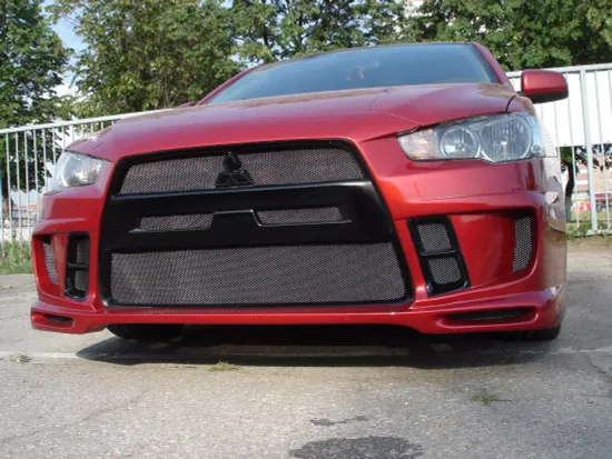 Бампер передний EXTREME для Mitsubishi Lancer 10