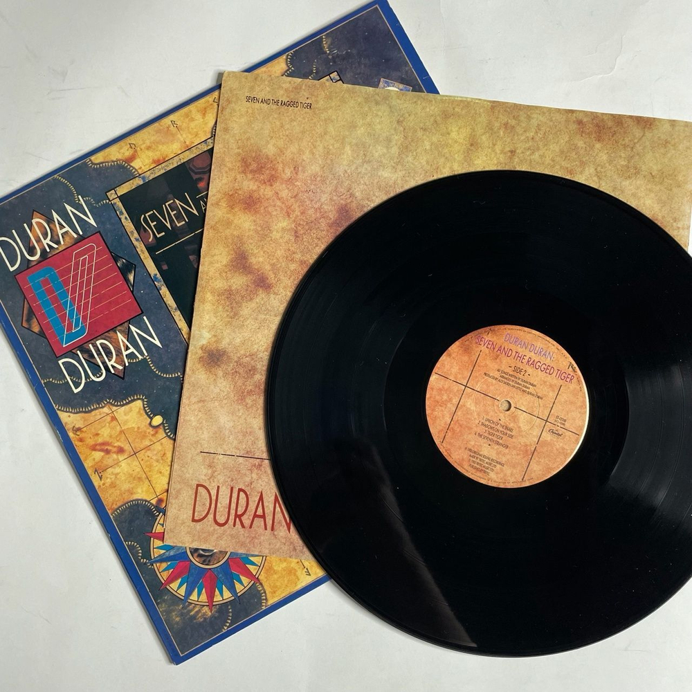 Винтажная виниловая пластинка LP Duran Duran Seven And The Ragged Tiger (USA 1983)