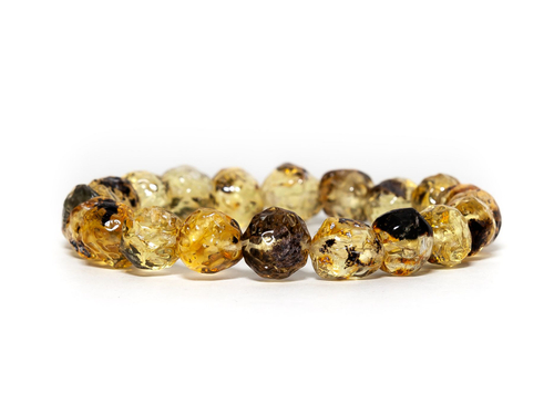 Браслет из цельного натурального янтаря, бусины 8-9 мм "кусанка с включениями"