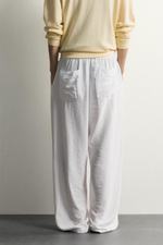 БРЮКИ RELAXED FIT ИЗ СТРУЯЩЕЙСЯ ТКАНИ — ZARA · 7446/306