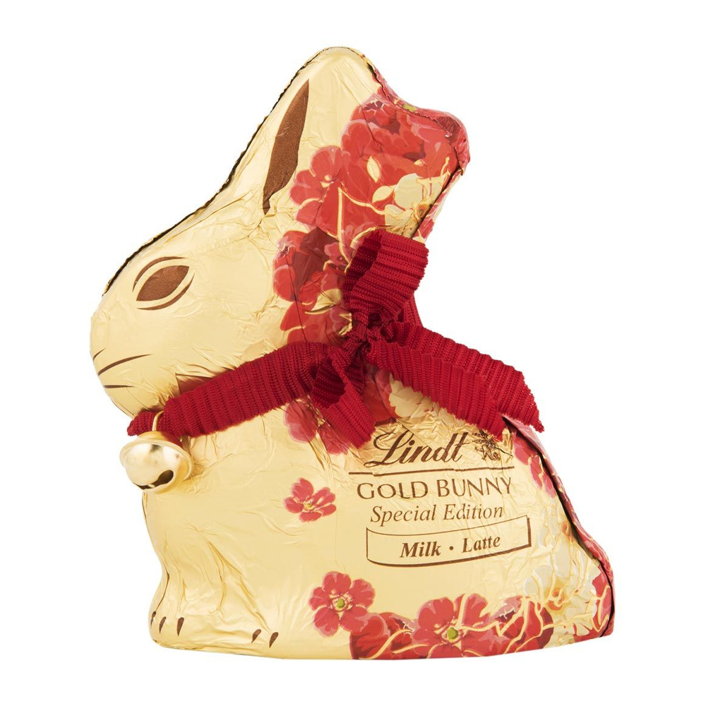 Пасхальный заяц из молочного шоколада Lindt GOLD BUNNY milk Latte special edition красный бант, в цветочек, 100 г (Из Финляндии)