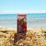 Ароматическое масло Вишня Крымские масла на фоне моря в Крыму