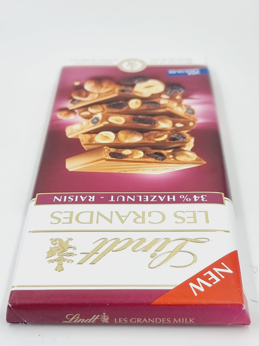 Молочный шоколад Lindt LES GRANDES Hazelnut & Raisin Фундук и изюм, 150 г (из Финляндии)