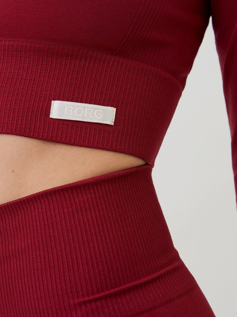 Женская теннисная футболка с длинным рукавом Björn Borg Stockholm Seamless Crop Top W - biking red