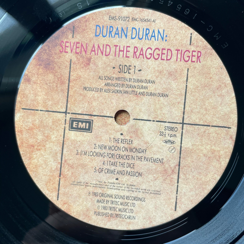Винтажная виниловая пластинка LP Duran Duran Seven And The Ragged Tiger (Япония 1983) (Оби)