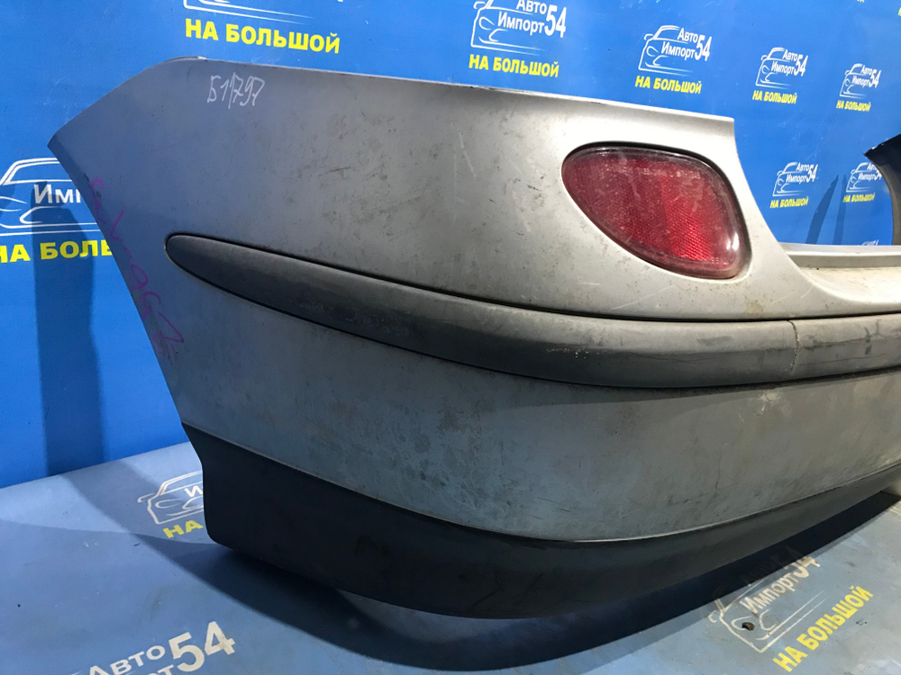 Бампер задний NISSAN TINO 1998-2003