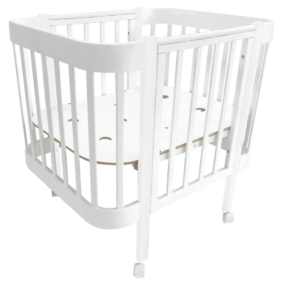 Кровать детская Indigo Italiano Baby продольный маятник на колесах белый-белый
