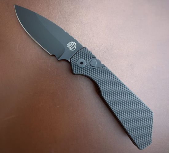 Автоматический нож PTPT207 Strider PT - черн. текстур. алюм. рук-ть, черн. клинок Magnacut